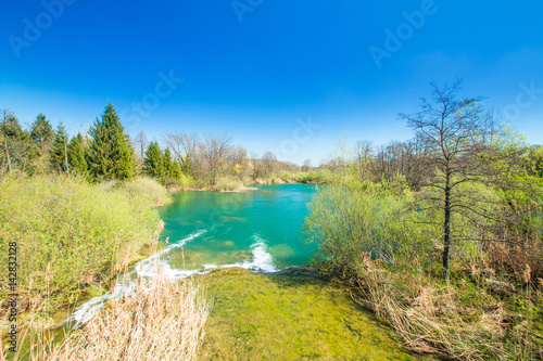 Beautiful landscape, waterfall, clear green water and on Mreznica river in Croatia. Beautiful world. Panoramic view. 