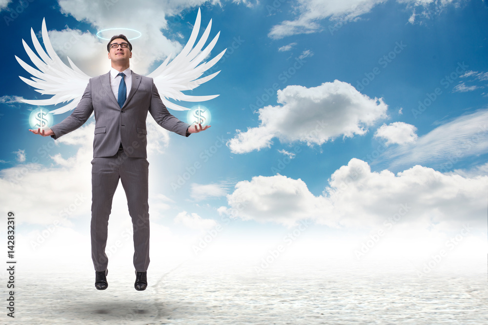 Angel investor concept with businessman with wings Angel investor concept with businessman with wings