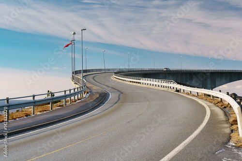 Seaside road bend with blue sky in clear day