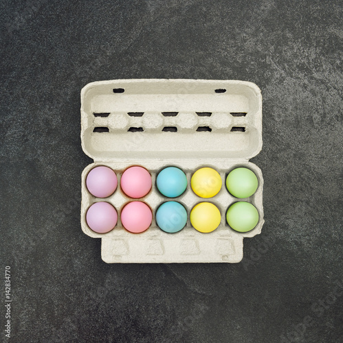 Easter eggs egg box black background