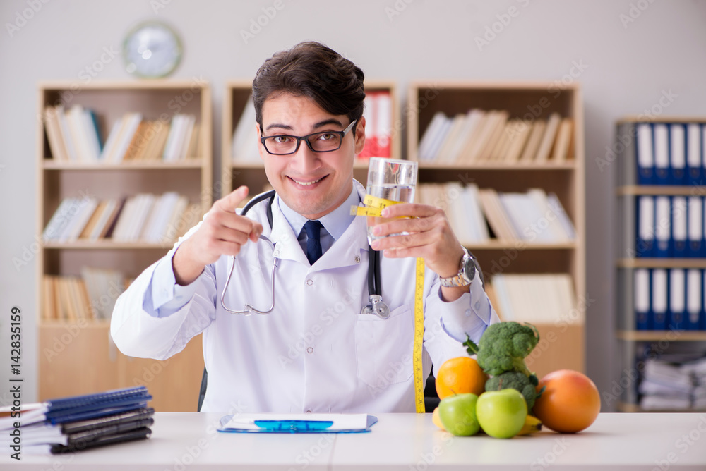 Doctor in dieting concept with fruits and vegetables Doctor in dieting concept with fruits and vegetables