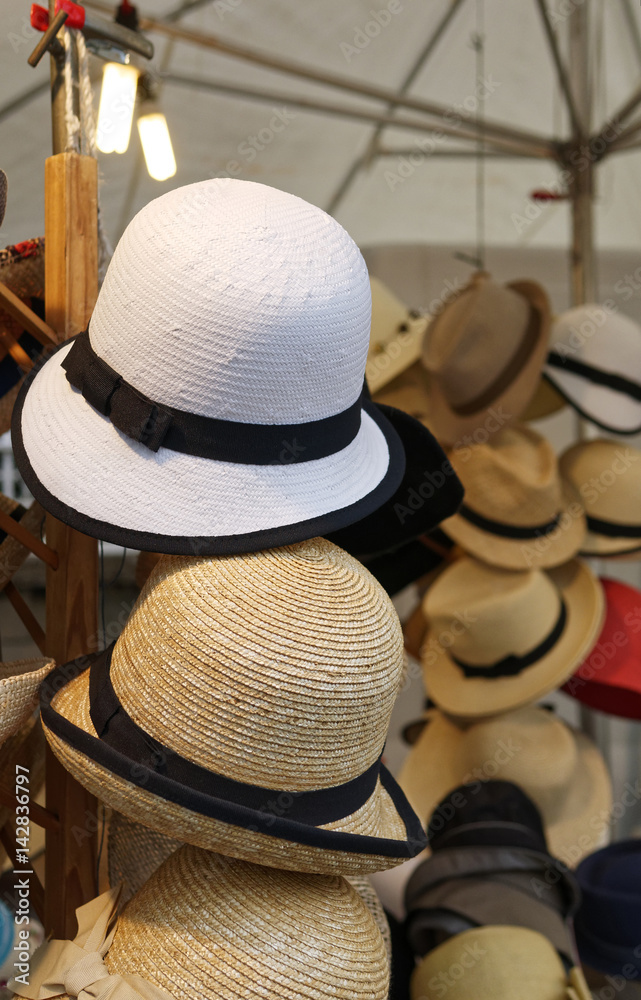 detail of hats at market