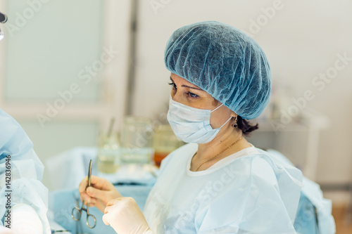 portrait of Surgeon operating live shot photo