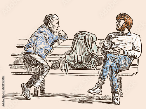 Citizens talk on a street bench