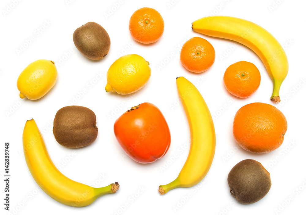 Fruit collection of banana, kiwi, mandarin, orange, persimmons and lemon isolated on white background. Flat lay, top view Fruit collection of banana, kiwi, mandarin, orange, persimmons and lemon isolated on white background. Flat lay, top view