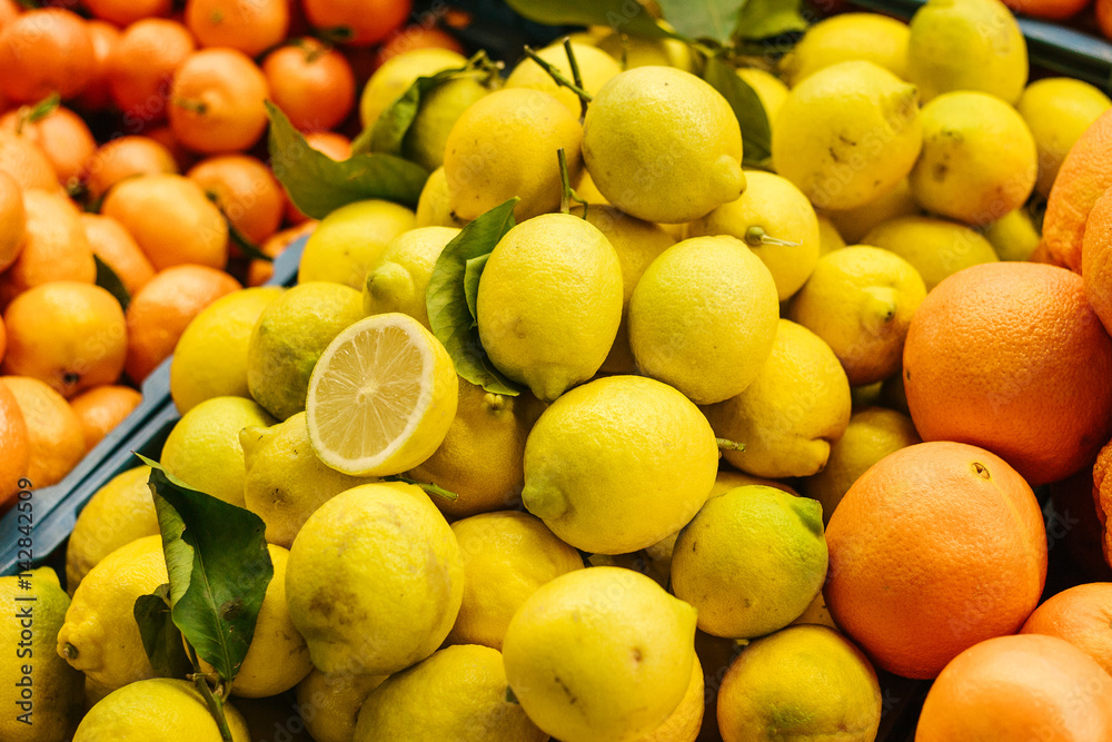 Citrus mix from fresh lemon, tangerine, orange on the farm market. Products rich in vitamins. Natural local products on the farm market. Harvest. Seasonal products. Food.