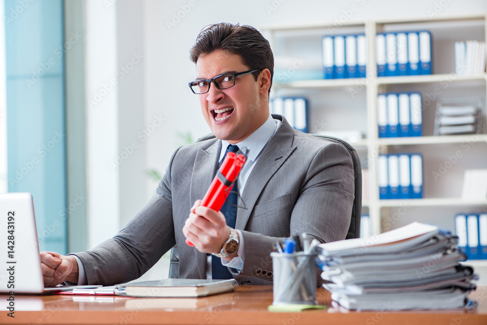 Angry aggressive businessman in the office Angry aggressive businessman in the office