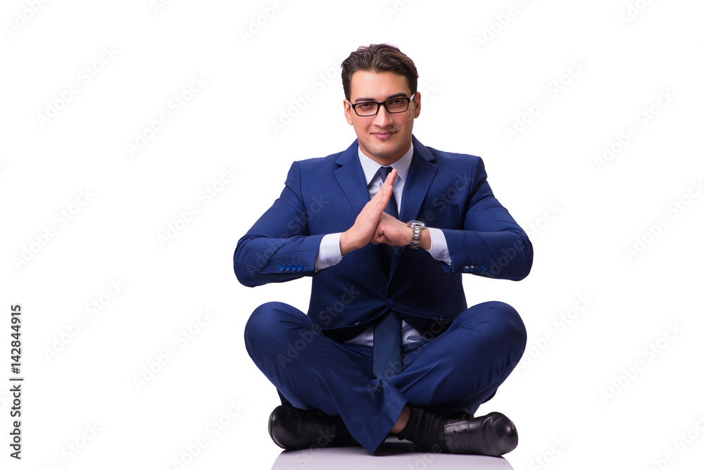 Businessman sitting on the floor isolated on white Businessman sitting on the floor isolated on white