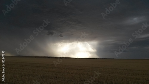 The rain is coming the sun stands behind