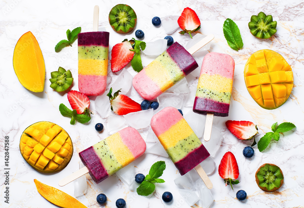 Naklejka strawberry mango kiwi blueberry ice cream with fruits and ices