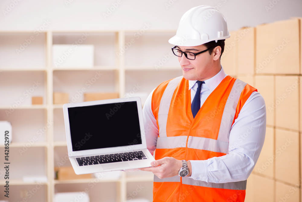Man working in postal parcel delivery service office Man working in postal parcel delivery service office