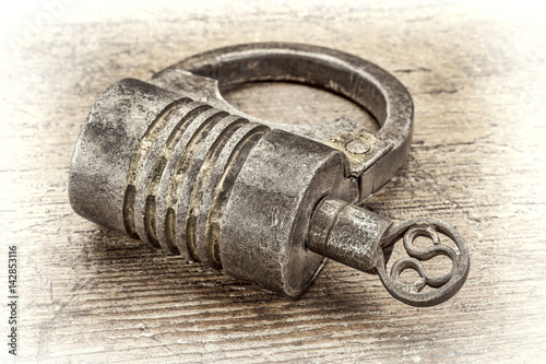 vintage screw type iron padlock
