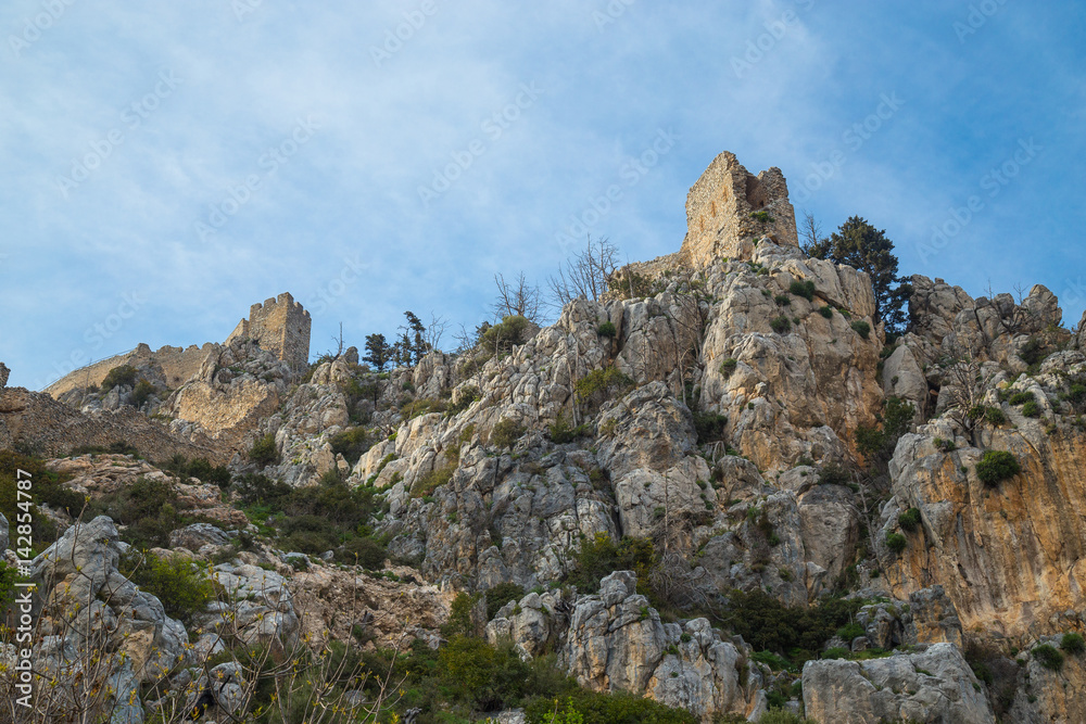 The Saint Hilarion Castle lies on the Kyrenia mountain range, in Cyprus. This location provided the castle with command of the pass road from Kyrenia to Nicosia. Beautiful Castle in the Mountains.