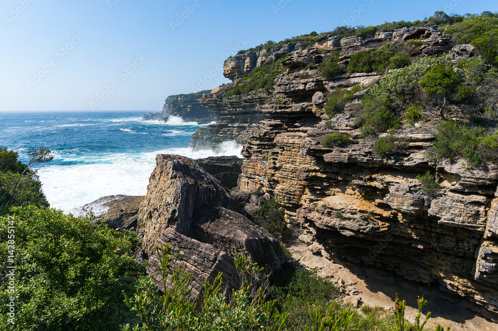 Rough cliff with rapid ocean waves landscape