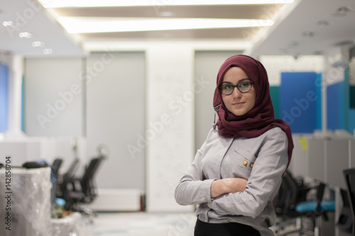 Portrait of young business woman in office