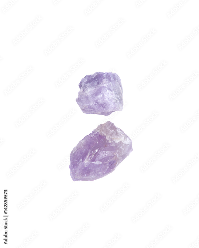 Natural amethyst chunks from Madagascar isolated on white background