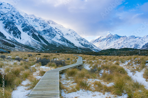 Path in mountain valley in winter