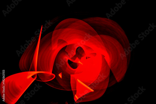 Spooky sillhoette of hooded man in laser saber light painting photo
