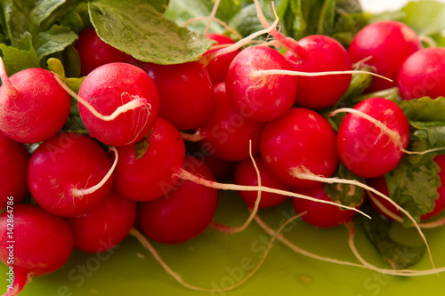 Close up view of fresh red radishes