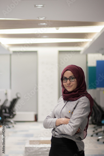 Portrait of young business woman in office