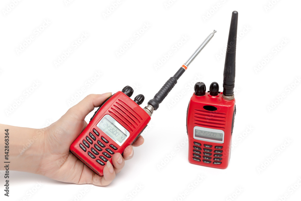 Portable radio transceiver on white background.