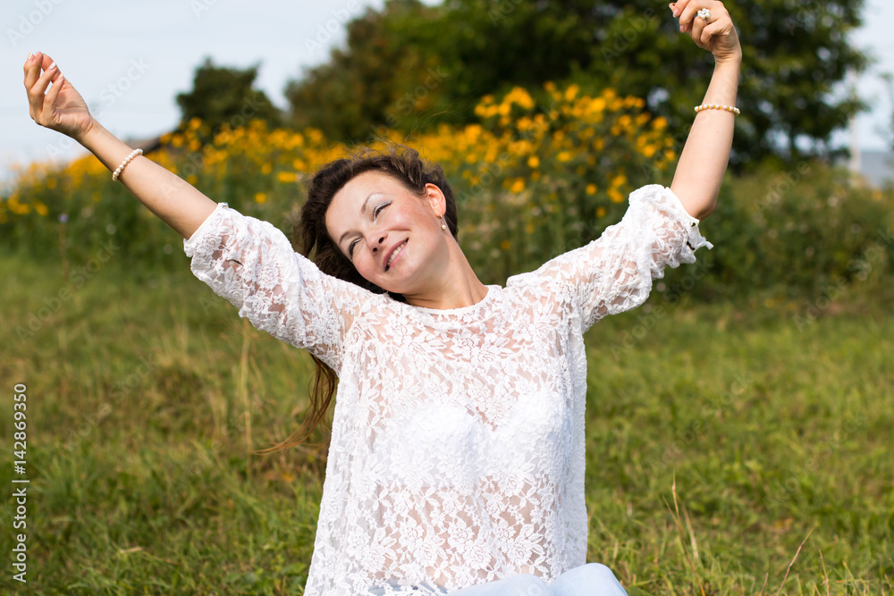 Nice girl and flowers in a nice day