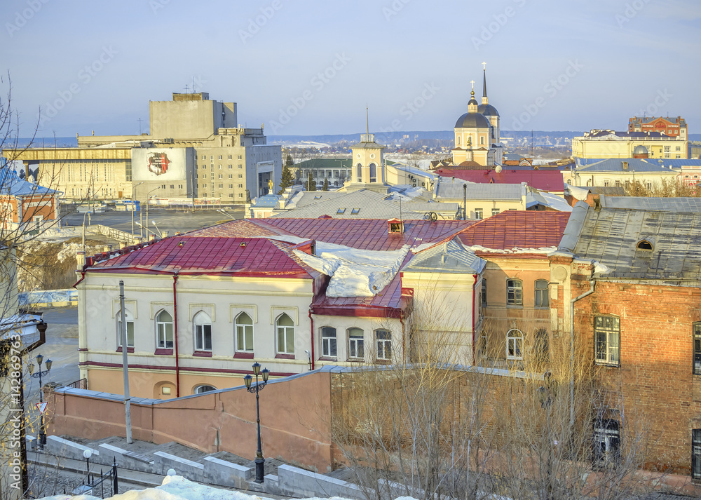 old town landscape with pavement street and grunge houses Tomsk Siberia Russia