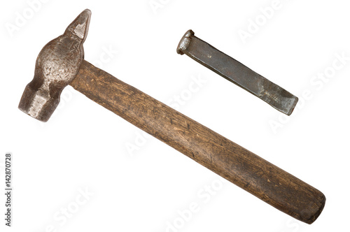 Old hammer and chisel isolated on white background