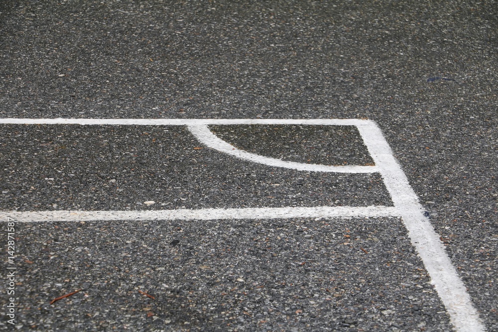 Fototapeta premium Football field corner asphalt wet