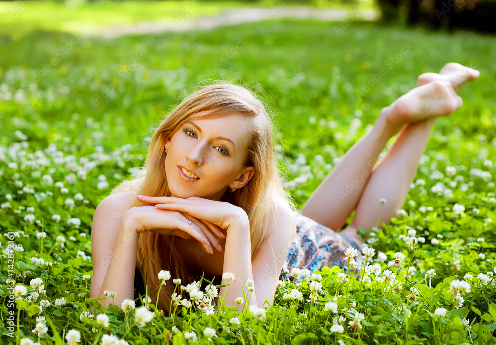 Woman relaxing outdoors smiling