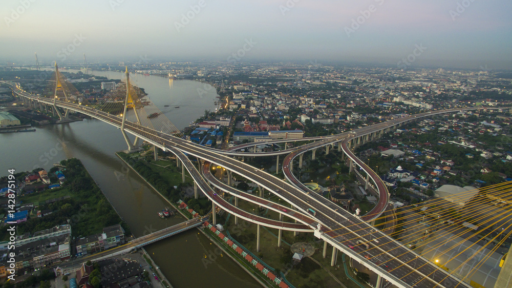 aerial view of bhumibol bridge crossing chaopraya river in bangkok thailand