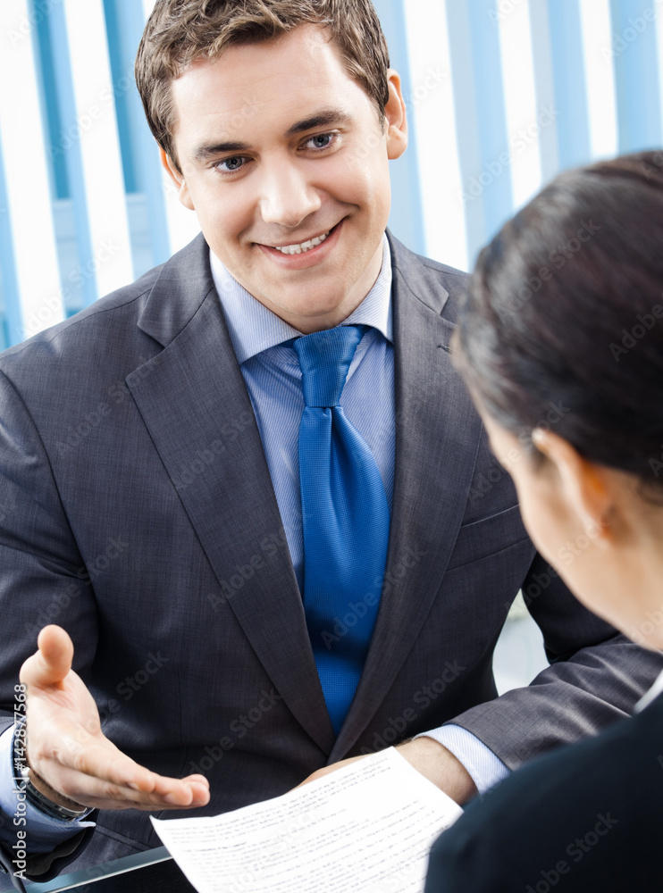 Happy businesspeople, or business man and client Happy businesspeople, or business man and client