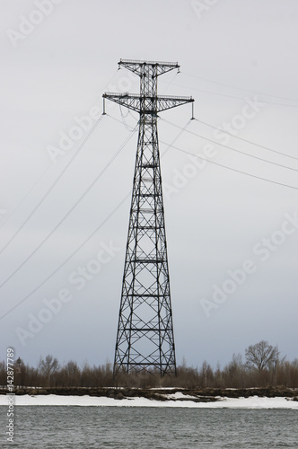 Support Of A High-voltage Electric оn the river bank