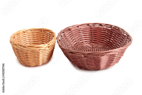 Wicker basket for bread on white background