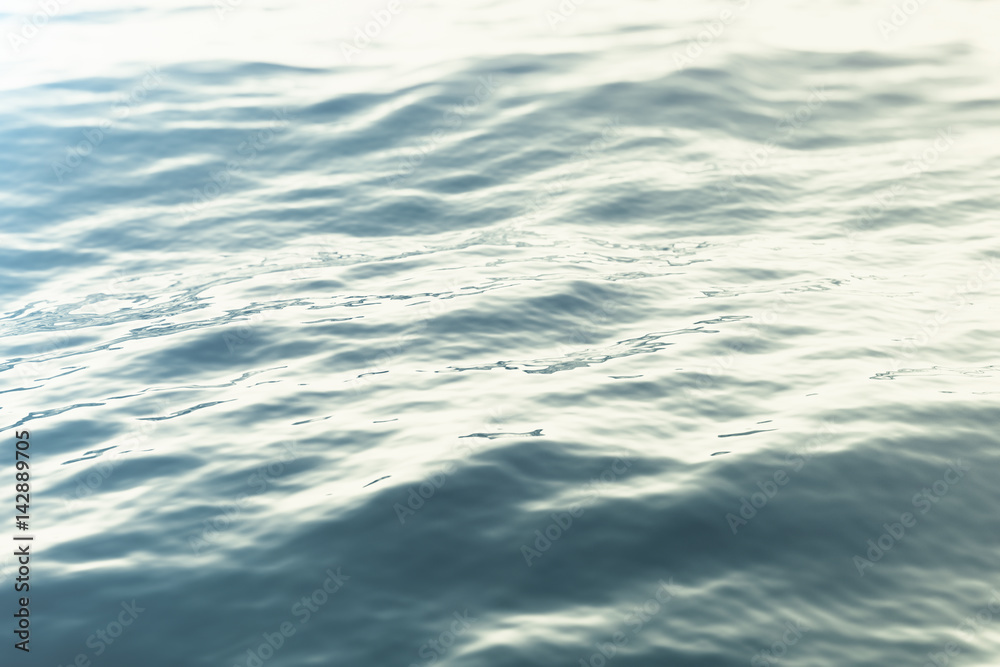 Sea, ocean wave close-up sunset, low angle view, cross processing effect. Hard focus with selective . 3d rendering Sea, ocean wave close-up sunset, low angle view, cross processing effect. Hard focus with selective . 3d rendering