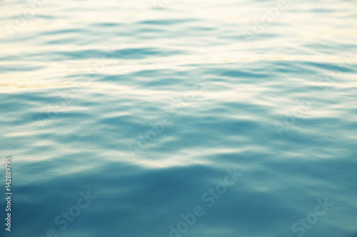 Blue water background with ripples, sea, ocean wave low angle view. Close-up Nature . Hard focus selective . 3d rendering