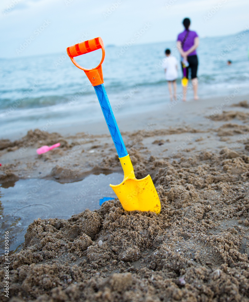 Group of children's beach toys on a sunny day. Group of children's beach toys on a sunny day.