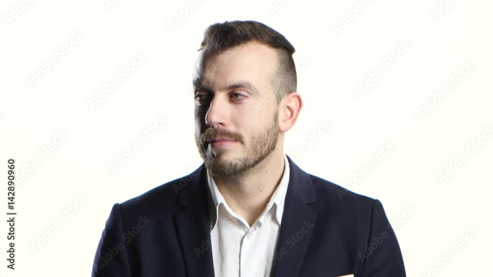 Man looks around with interest and at the end smiles Man looks around with interest and at the end smiles