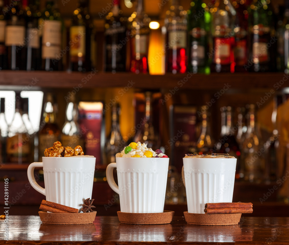 Three mugs with coffee cocktails