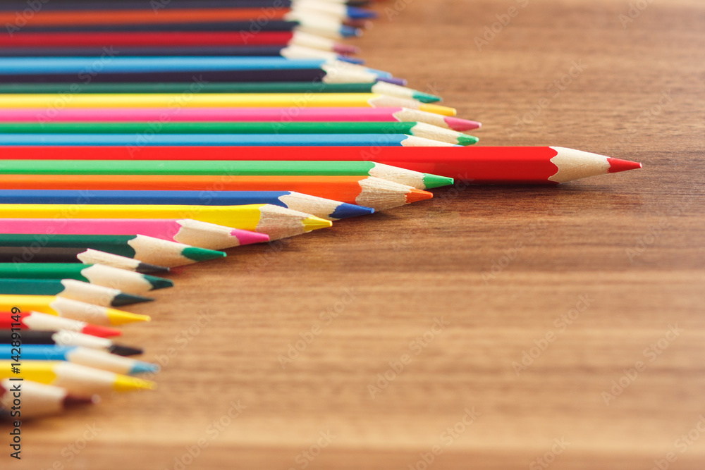 Set of colored pencils, wooden background Set of colored pencils, wooden background