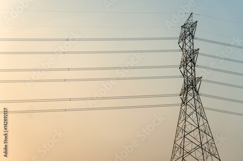 High voltage towers in the morning sky