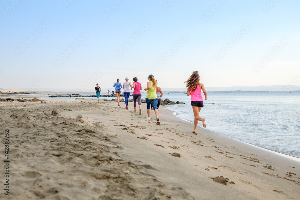 Jogging on the beach at dawn