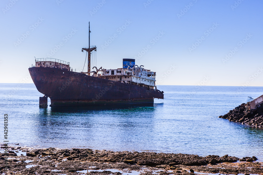 Old shipwrecks located in the seashore in Arrecife.