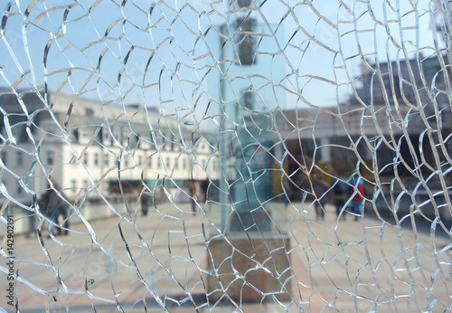 City view through broken glass.
