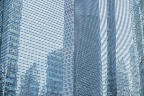 Business Modern architecture close up  texture windows of a high rise building