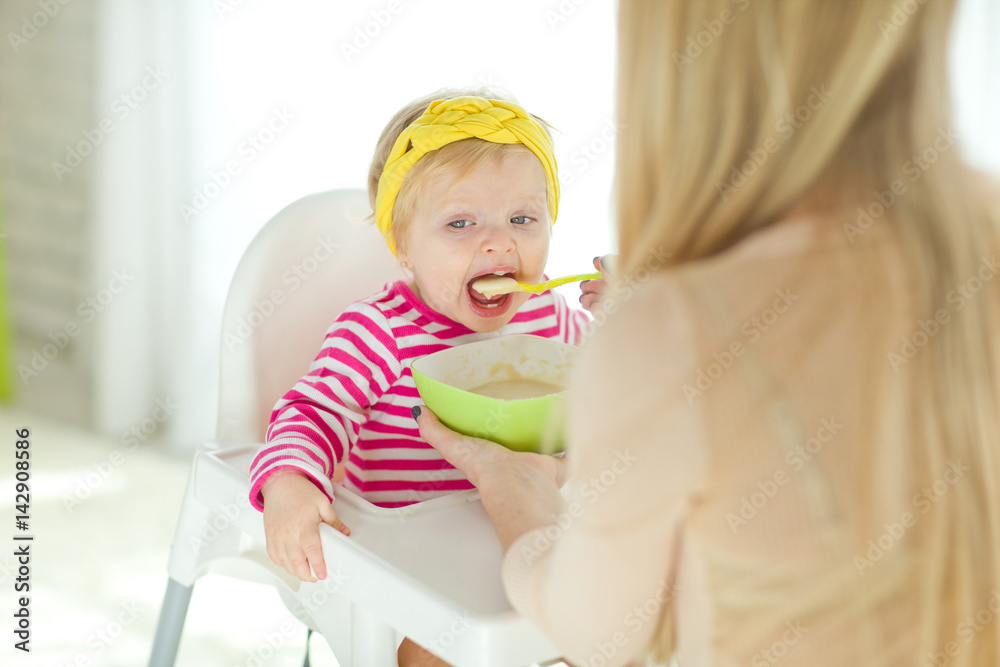 The baby eats The baby eats