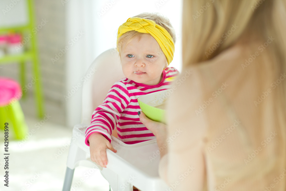 The baby eats The baby eats