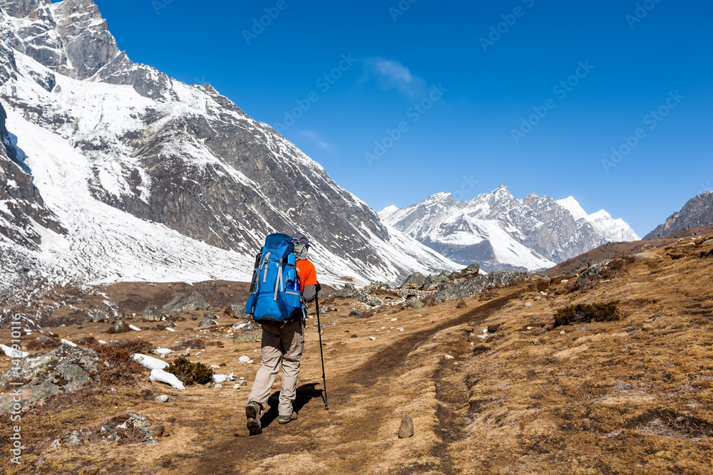 Trekker in Khumbu valley on a way to Everest Base camp Trekker in Khumbu valley on a way to Everest Base camp