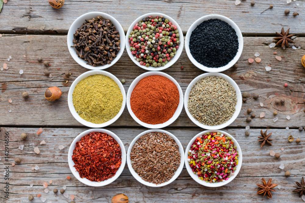 Various spices on wooden spoons. Food ingredients Various spices on wooden spoons. Food ingredients