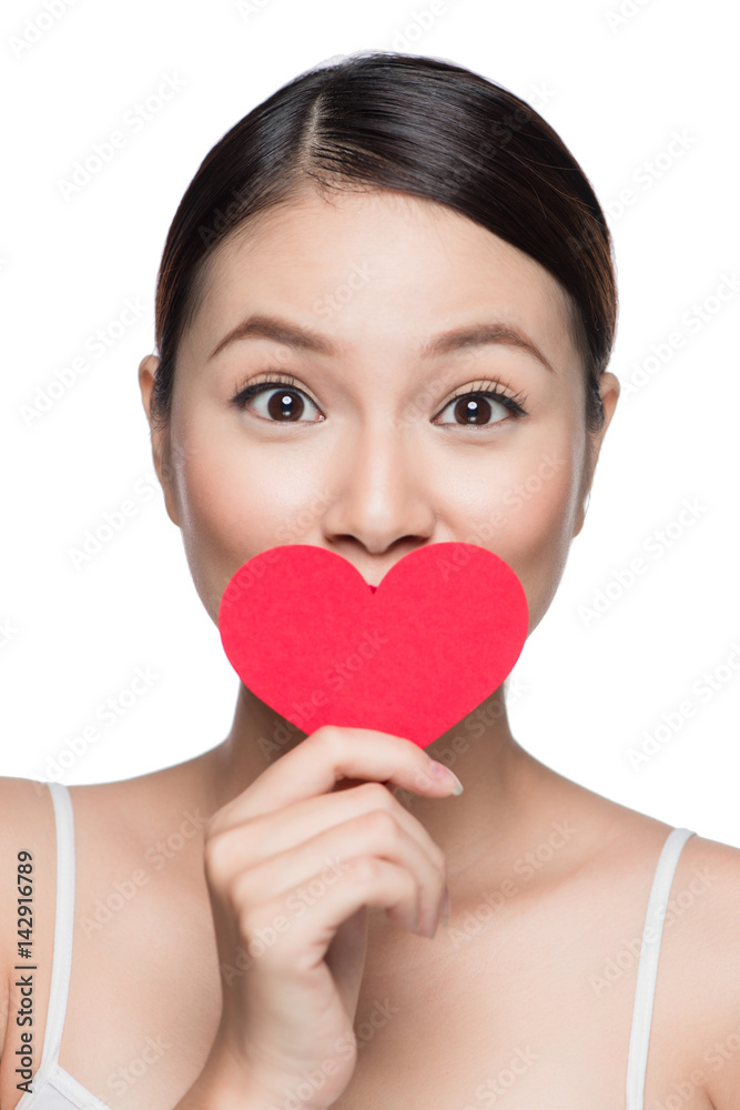 Attractive young woman with red heart. Valentine's day art portrait. Perfect make up Attractive young woman with red heart. Valentine's day art portrait. Perfect make up